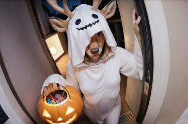 anthro antlers blonde_hair breasts brown_eyes candy dessert female food ghost_costume hair halloween halloween_costume horn jack-o'-lantern looking_at_viewer small_breasts solo tongue tongue_out trick-or-treating jelloponies halloween_2025 cervid mammal absurd_res hi_res