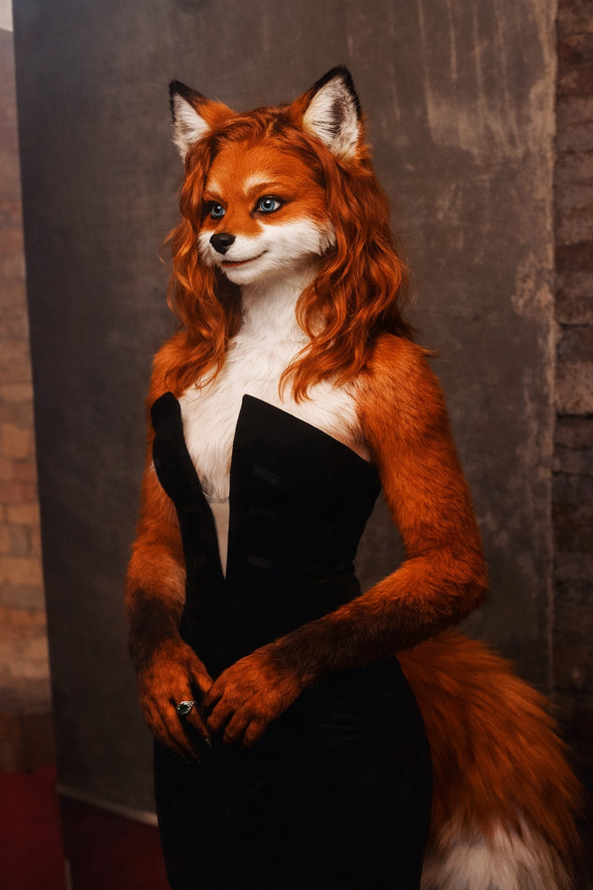 anthro black_clothing black_dress blue_eyes classy clothing deep_v_neck digitigrade dress elegant evening_dress female fluffy_fur fox_ears fox_tail photorealism solo strapless_clothing strapless_dress studio_lighting vulpine fauirien canid canine fox mammal red_fox hi_res portrait